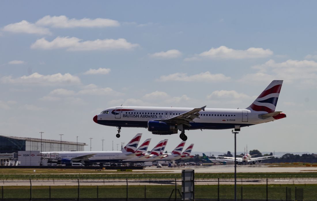 British Airways aircraft landing at Heathrow Airport, London airport transfer pricing